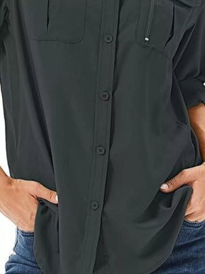 Black roll-up sleeve button-up shirt with chest pockets and a zip pocket detail.