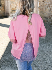 Pink cotton blend oversized tee with lace back and trim detail.