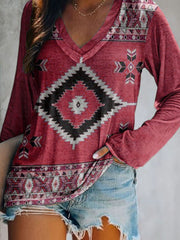 Red geometric print V-neck long sleeve t-shirt with bohemian pattern detail.