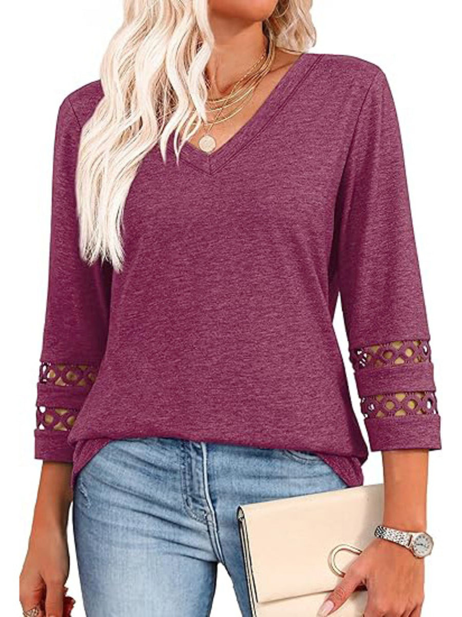 Burgundy 3/4 sleeve t-shirt with V-neck and cutout detail on sleeves.