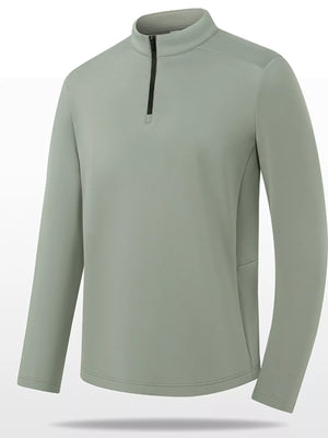 Plus-size sage green quarter-zip sweatshirt with a black zipper and stand-up collar.