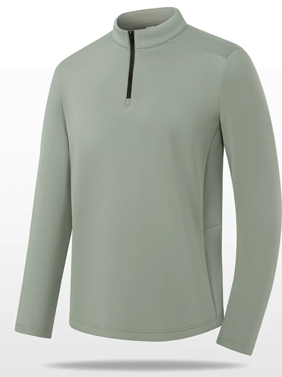 Plus-size sage green quarter-zip sweatshirt with a black zipper and stand-up collar.