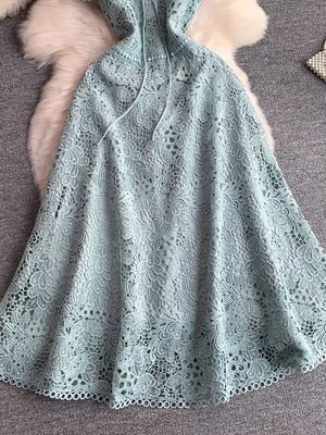 Sky blue floral lace A-line dress with tie detail and cutout design.