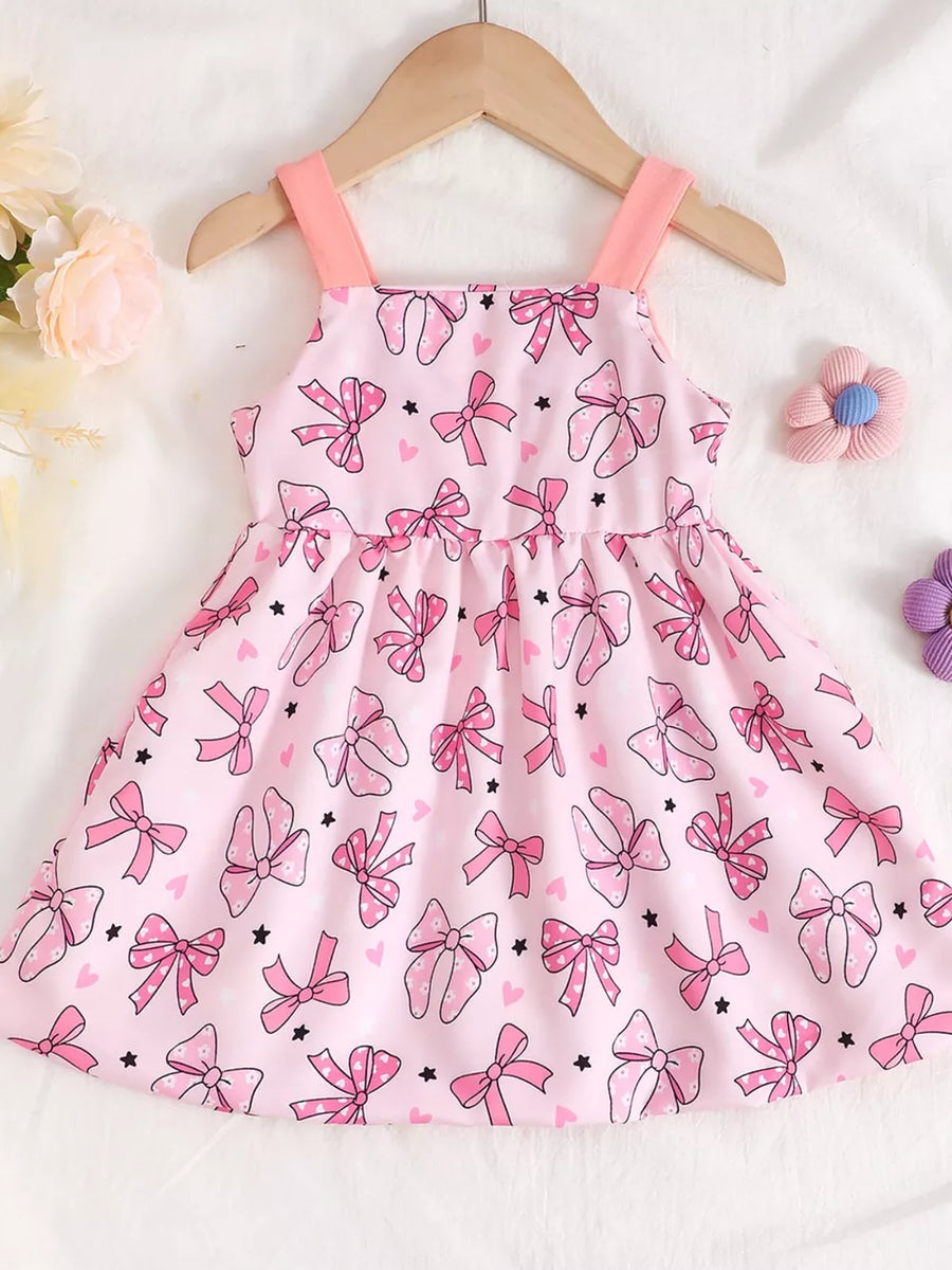 Pink baby dress with allover bow and heart print, cotton, square neck, sleeveless.