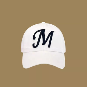 White baseball cap with embroidered black M