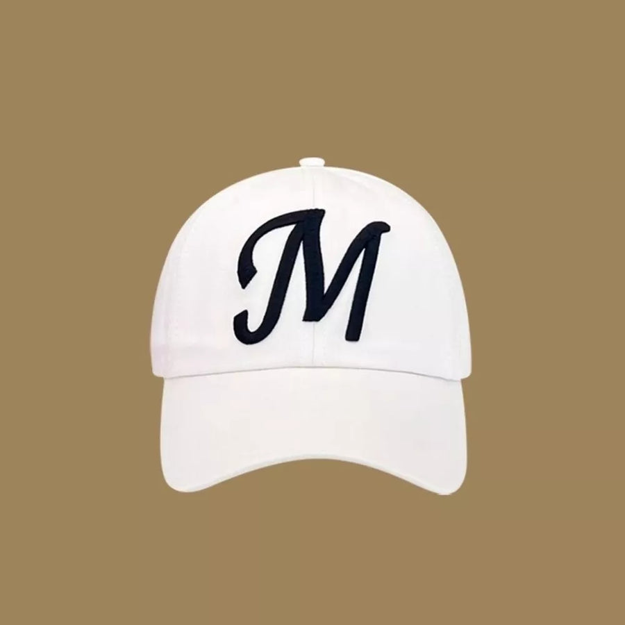 White baseball cap with embroidered black M