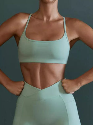 sports bra in mint green featuring backless and fitted fit