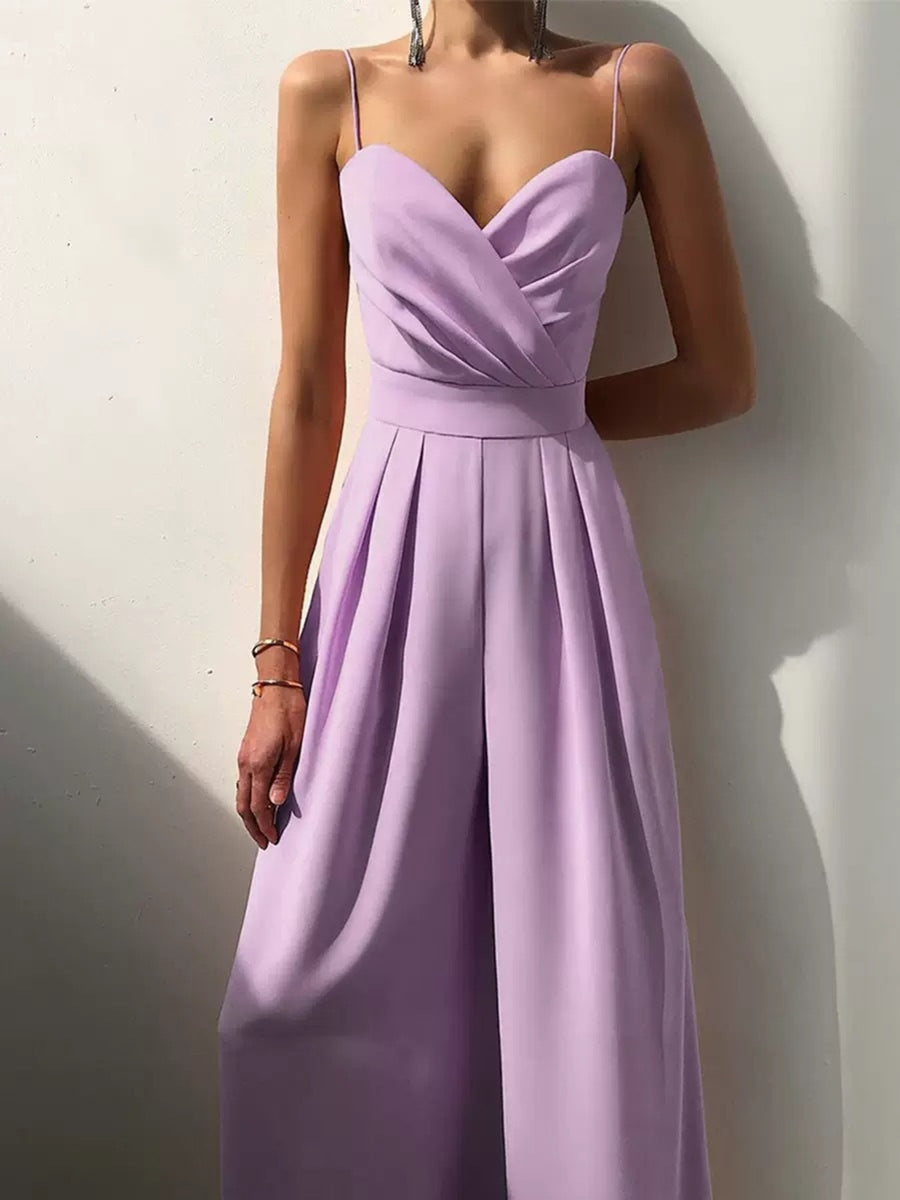 Violet ruched spaghetti strap wide-leg jumpsuit with a sweetheart neckline and pleated pants.