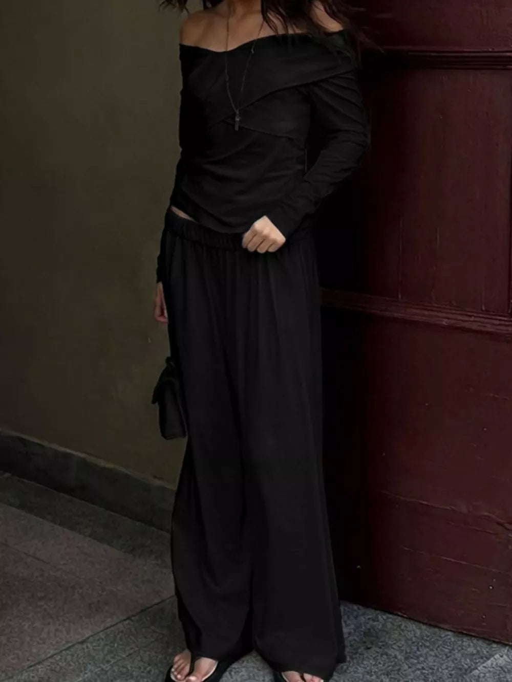 Black wide-leg off-shoulder top and wide-leg pants set with off-shoulder