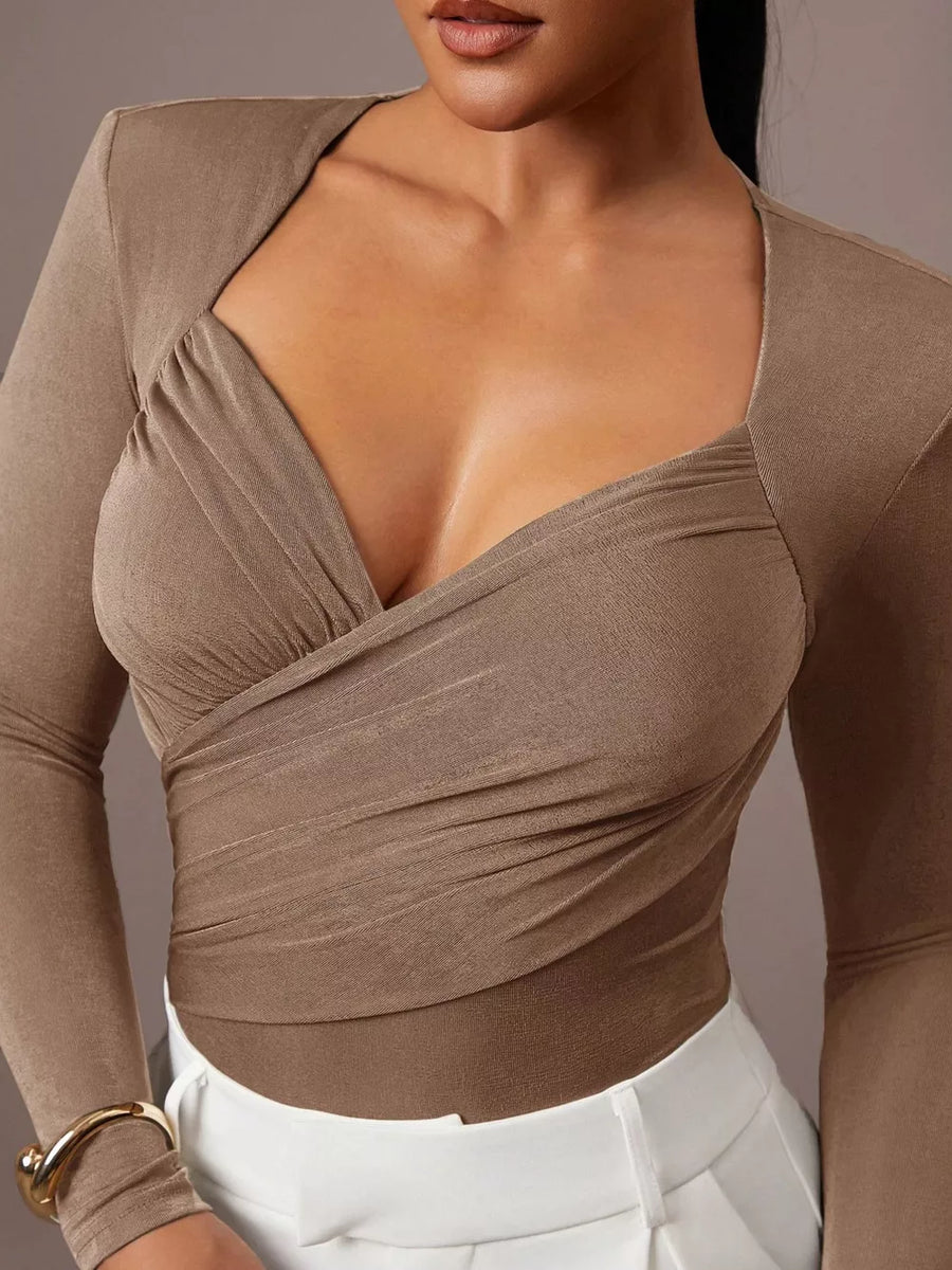 burgundy bodysuit with stretch and long sleeve