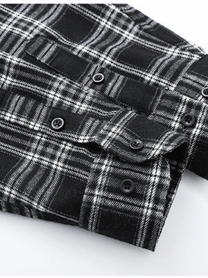 Men's black plaid button-up shirt with cotton blend fabric and button details.