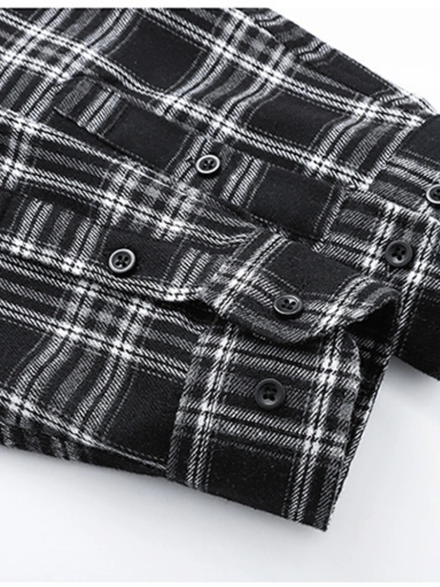 Men's black plaid button-up shirt with cotton blend fabric and button details.