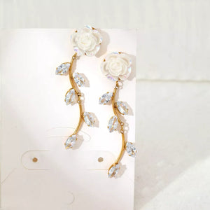 earrings in gold featuring drop design and drop fit
