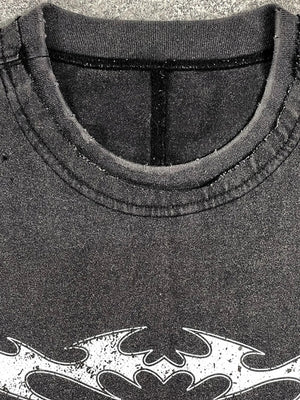 Black distressed graphic tee with distressed neckline and white graphic detail.