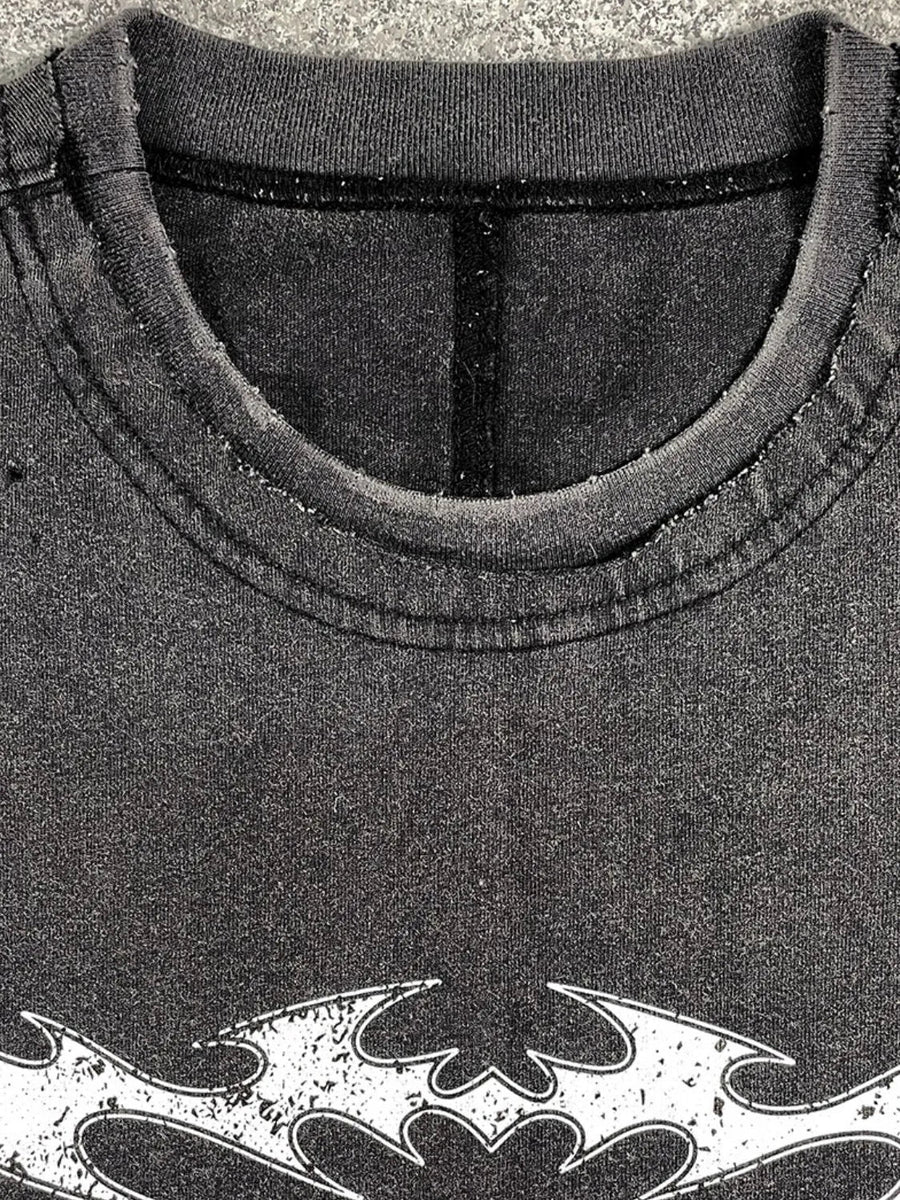 Black distressed graphic tee with distressed neckline and white graphic detail.