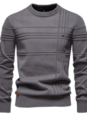 Gray crewneck sweater with textured horizontal and vertical panel details and a button accent.