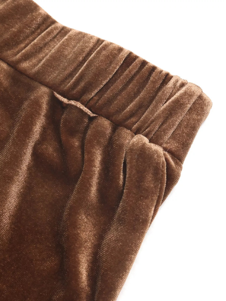 Brown velvet midi skirt with elastic waistband and pocket detail