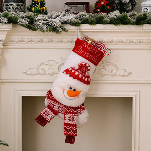 White Christmas stocking with snowman face, red snowflake scarf, and Merry Christmas text.