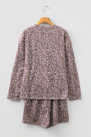 Leopard print ribbed loungewear set with long sleeves and shorts.