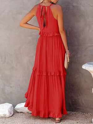 Orange Red ruffled maxi dress with tie-back detail and tiered skirt.