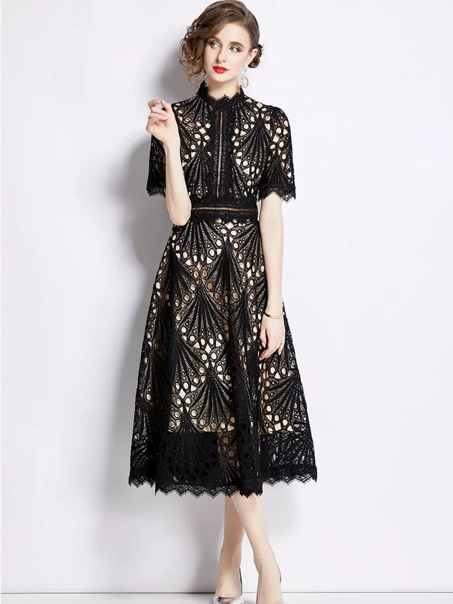 Elegant black lace midi dress with delicate sleeves and a-line skirt.
