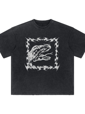 Black distressed graphic tee with dinosaur motif and tribal border.