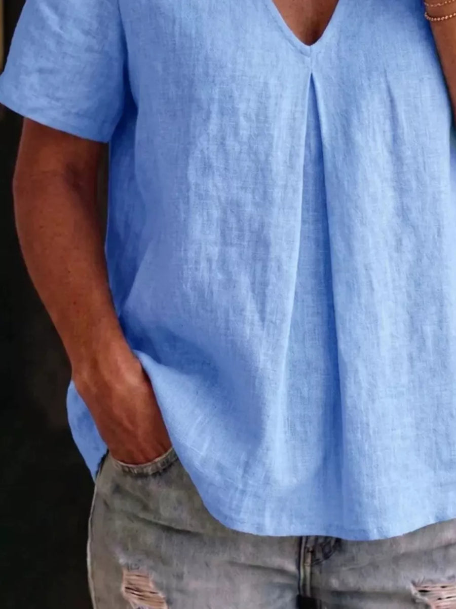 Blue linen v-neck short sleeve top with front pleats