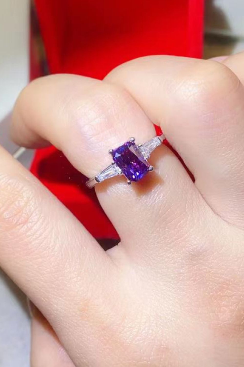 Purple emerald-cut moissanite and baguette platinum ring