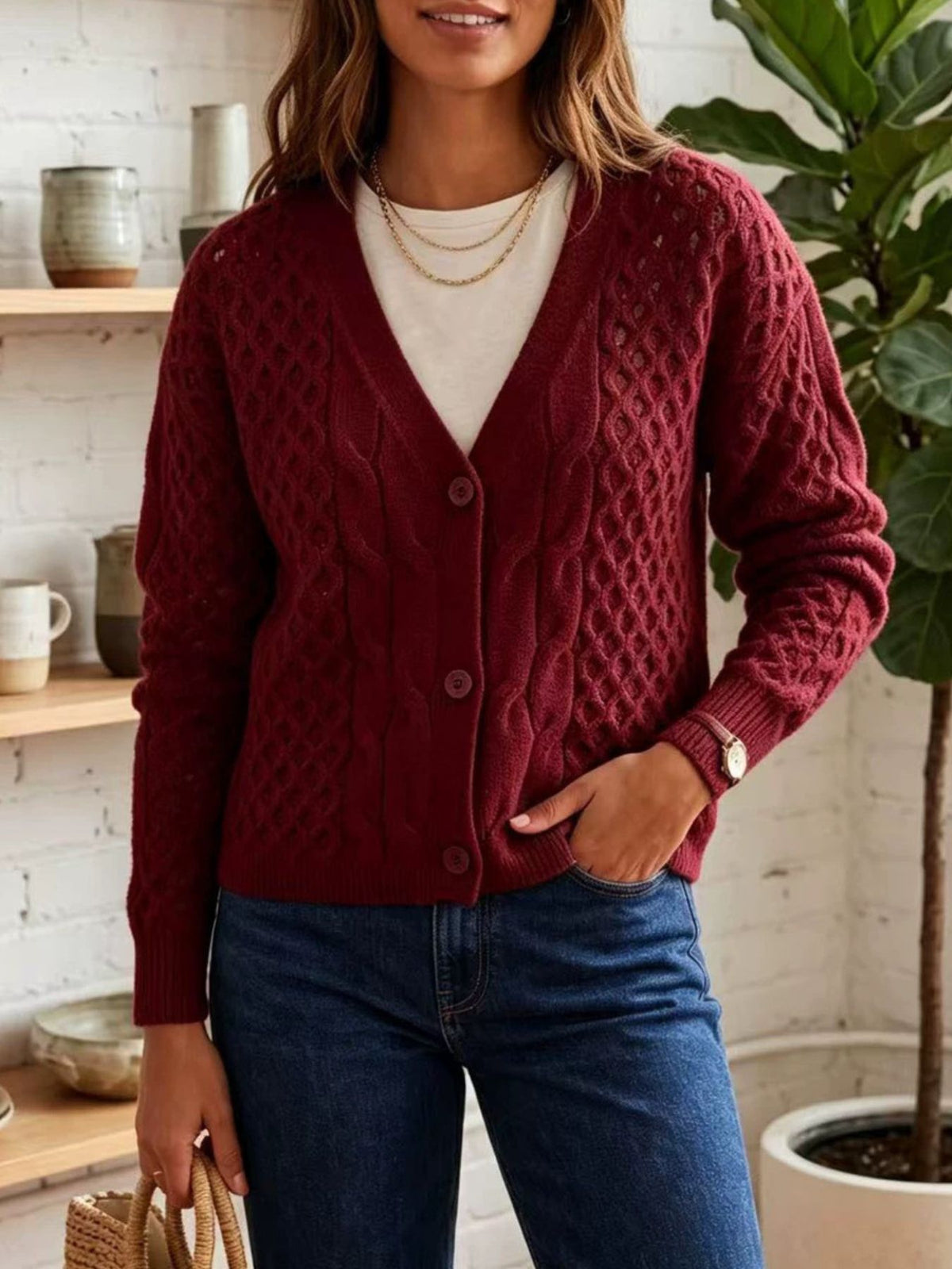ivory cardigan with button-front and cable knit