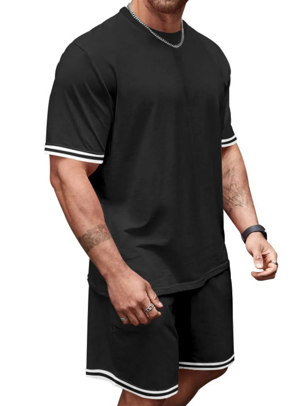 Black t-shirt and shorts set with white stripe trim on sleeves and hem