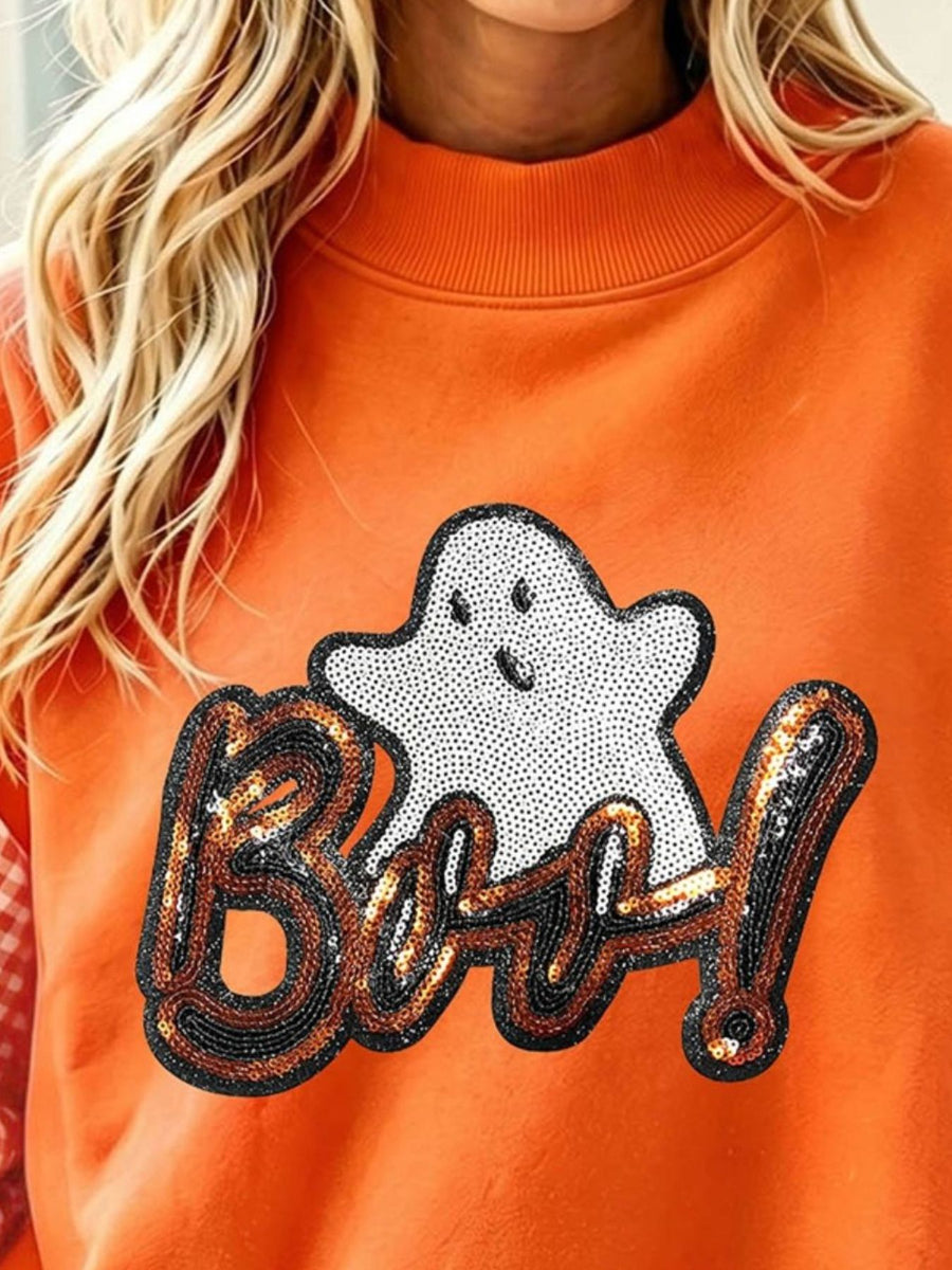 50% polyester, 50% cotton Care instructions: Machine wash cold sweatshirt in Orange with relaxed silhouette