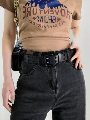 Black vegan leather belt with double grommets and silver alloy buckle.