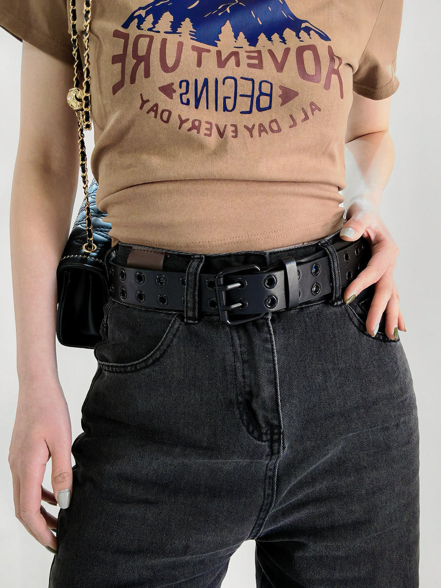 Black vegan leather belt with double grommets and silver alloy buckle.