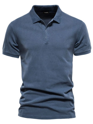 Textured short sleeve polo shirt in Peacock Blue with buttoned placket and classic collar.