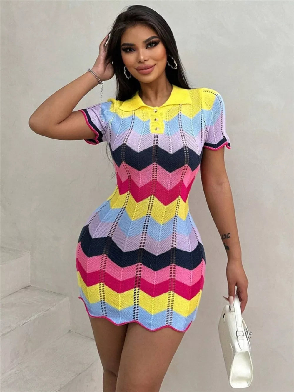Zigzag knit short sleeve polo dress in yellow, orange, pink, blue, and navy.