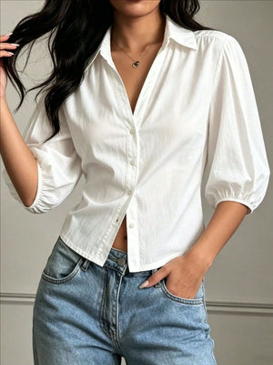 100% polyester Care instructions: Machine wash cold button-down shirt in Black with relaxed silhouette