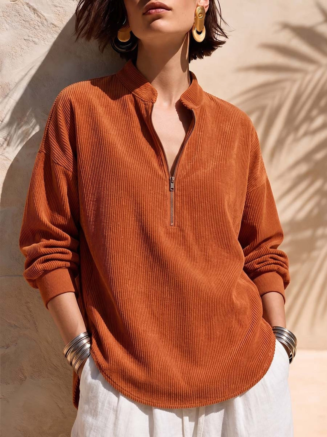 sweatshirt in rust featuring zipper and relaxed fit