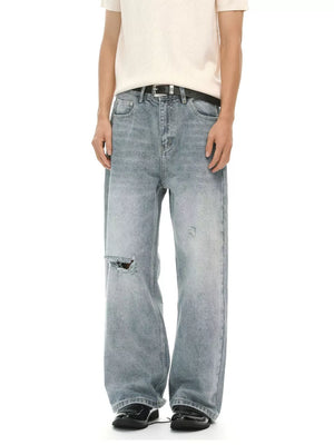 Light wash denim wide-leg jeans for men with distressed knee detail