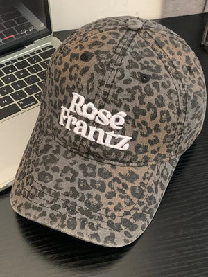 Leopard print cotton baseball cap with white Rose Frantz embroidery.