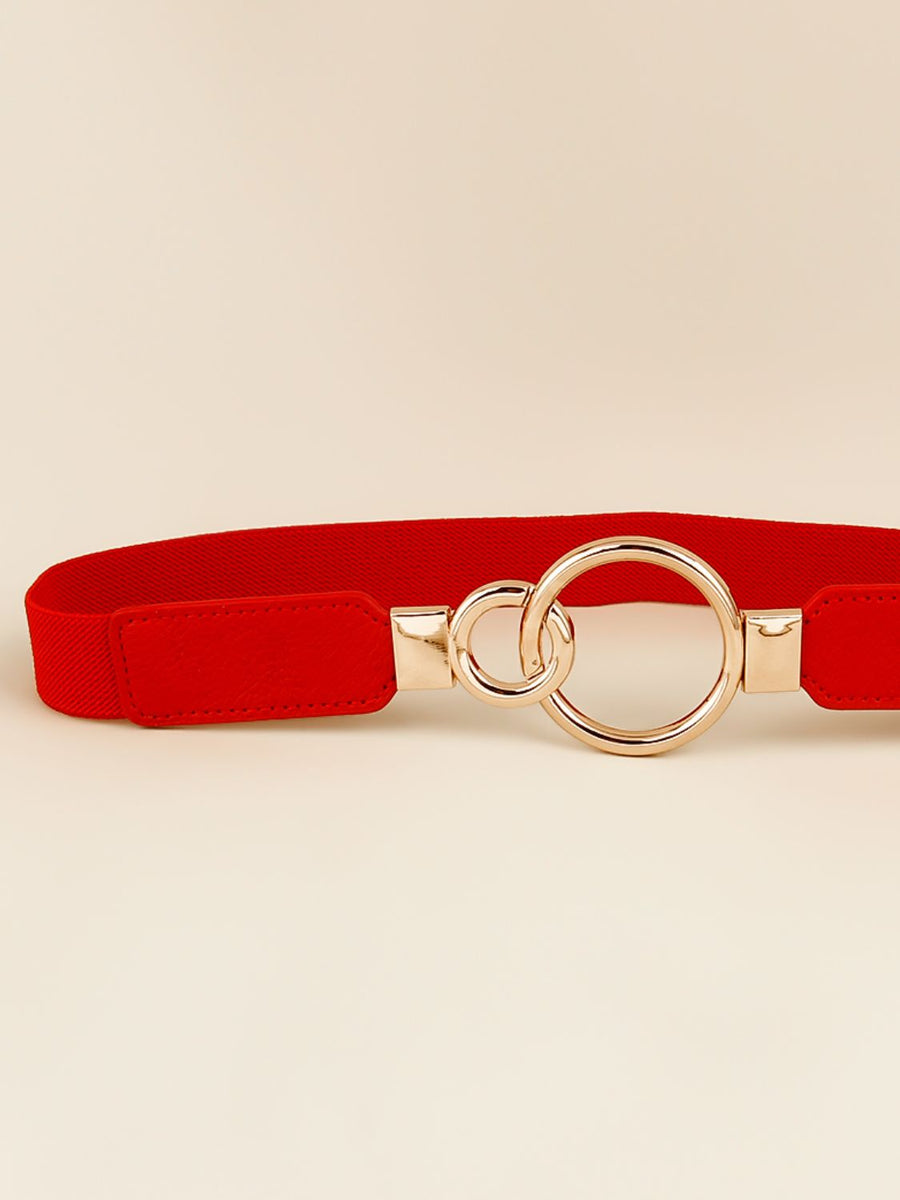 Red elastic belt with interlocked gold rings and buckle detail