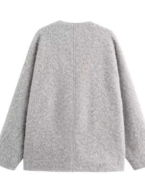 Textured knit tie-front coat in silver gray with a round neckline and long sleeves.