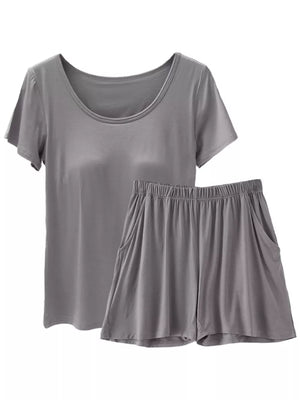 Heather gray two-piece pajama set with scoop neck t-shirt and elastic waist shorts with pockets.