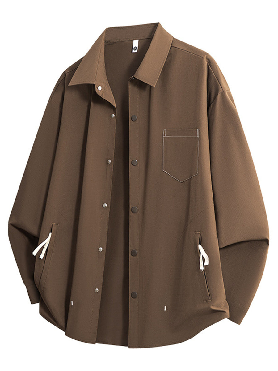 Brown oversized utility shirt with chest pocket and drawstring side pockets
