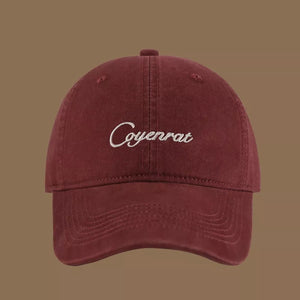 Maroon baseball cap with white embroidered text