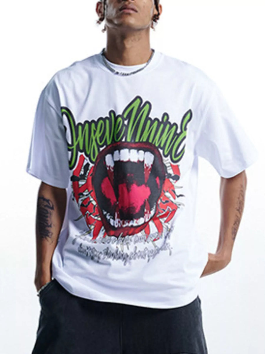 White 100% cotton oversized graphic t-shirt with bold red mouth and green text design.