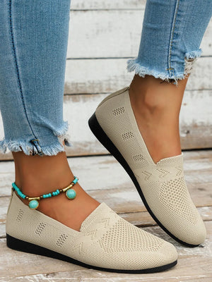 Breathable knit slip-on loafers in beige with a diamond pattern detail.