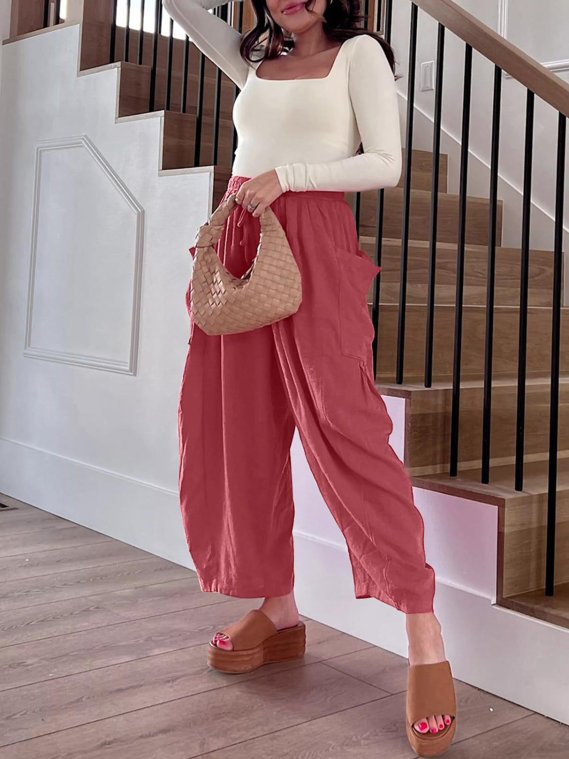 Linen balloon pants in strawberry with sculptural pocket detail.
