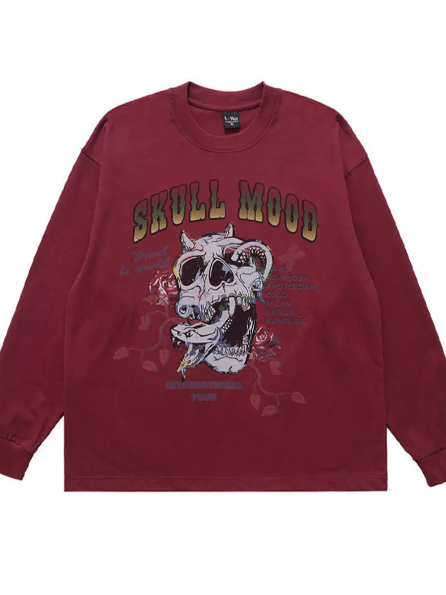 Maroon long sleeve t-shirt with skull and rose graphic print and tour text.