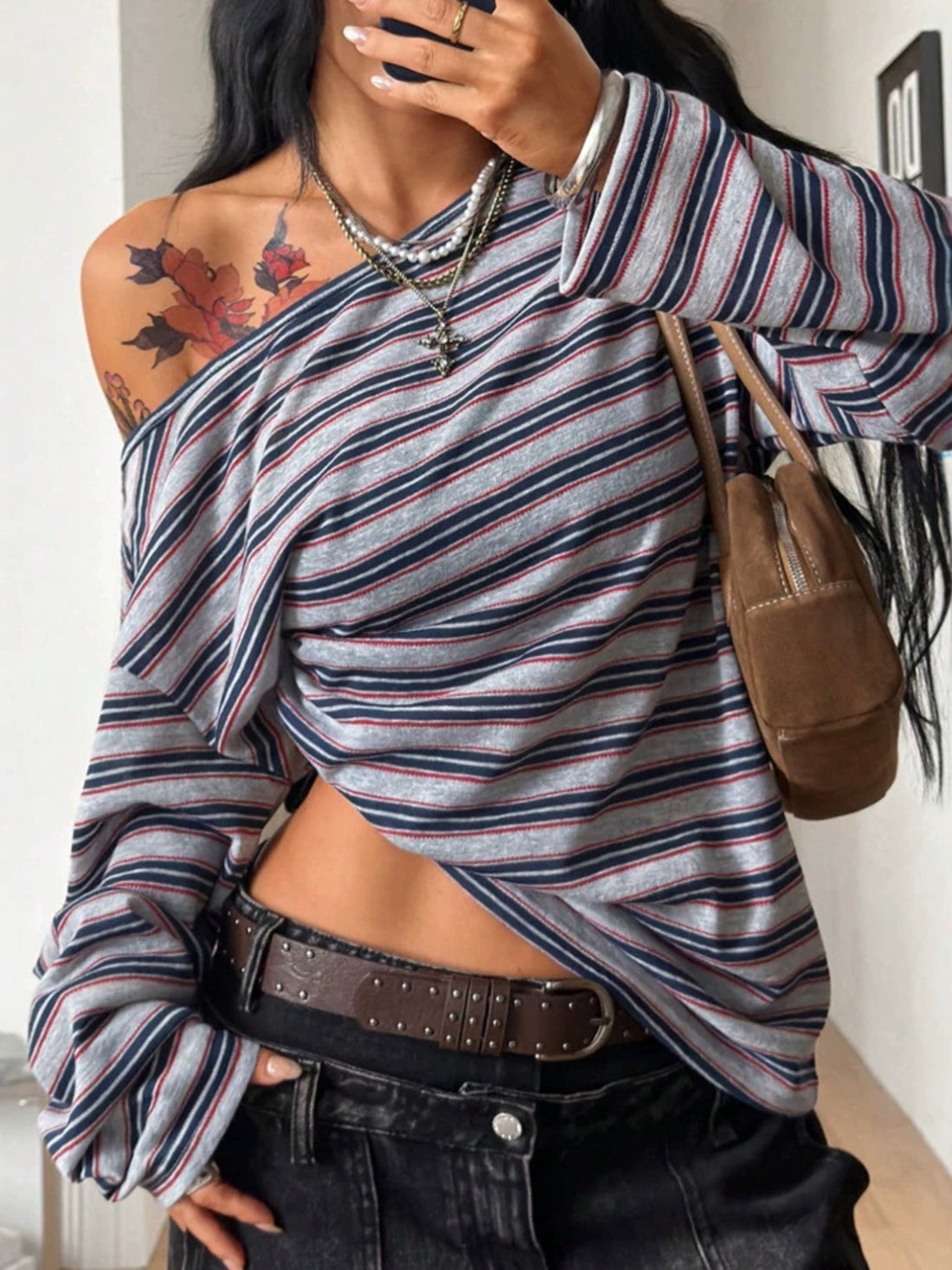 light gray off-shoulder top with striped and off-shoulder
