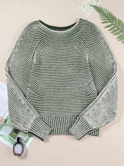 Relaxed ribbed knit sweater with boat neck and stripe pattern in green and white.